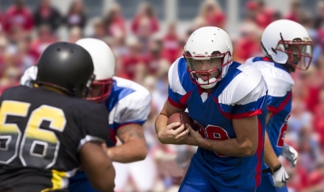 high school football players in action